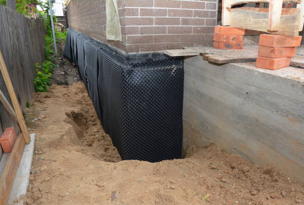 SJ Waterproofing Pros technician performing targeted Exterior Waterproofing assessment in Ferndale, MI